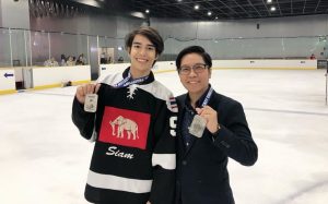 Dr. Tra Giang “Jane” Nguyen with Men's Hockey Player